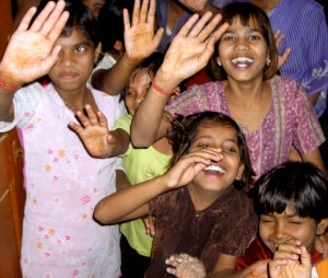 Waving girls in orphanage 2005-11-17 India II 108